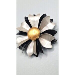 Vintage MCM Brooch Black, Silvertone & Goldtone Center Metal flower Brooch.k